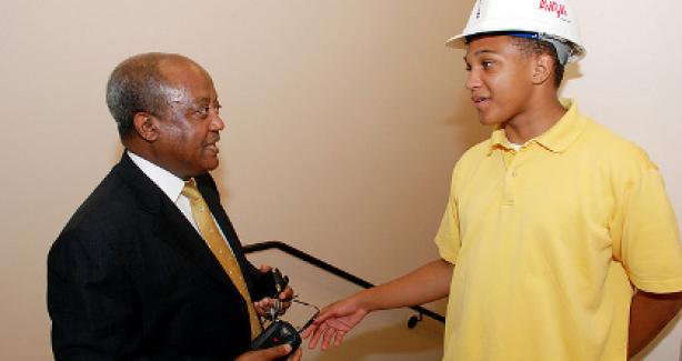 DC-Net intern explains the project to a school visitor