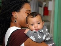 Community of Hope A woman holding her baby
