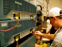 VPN Managed Circuits A man connecting wires