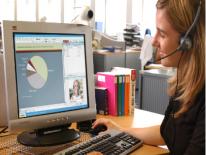 Woman conducting a web conference at her computer